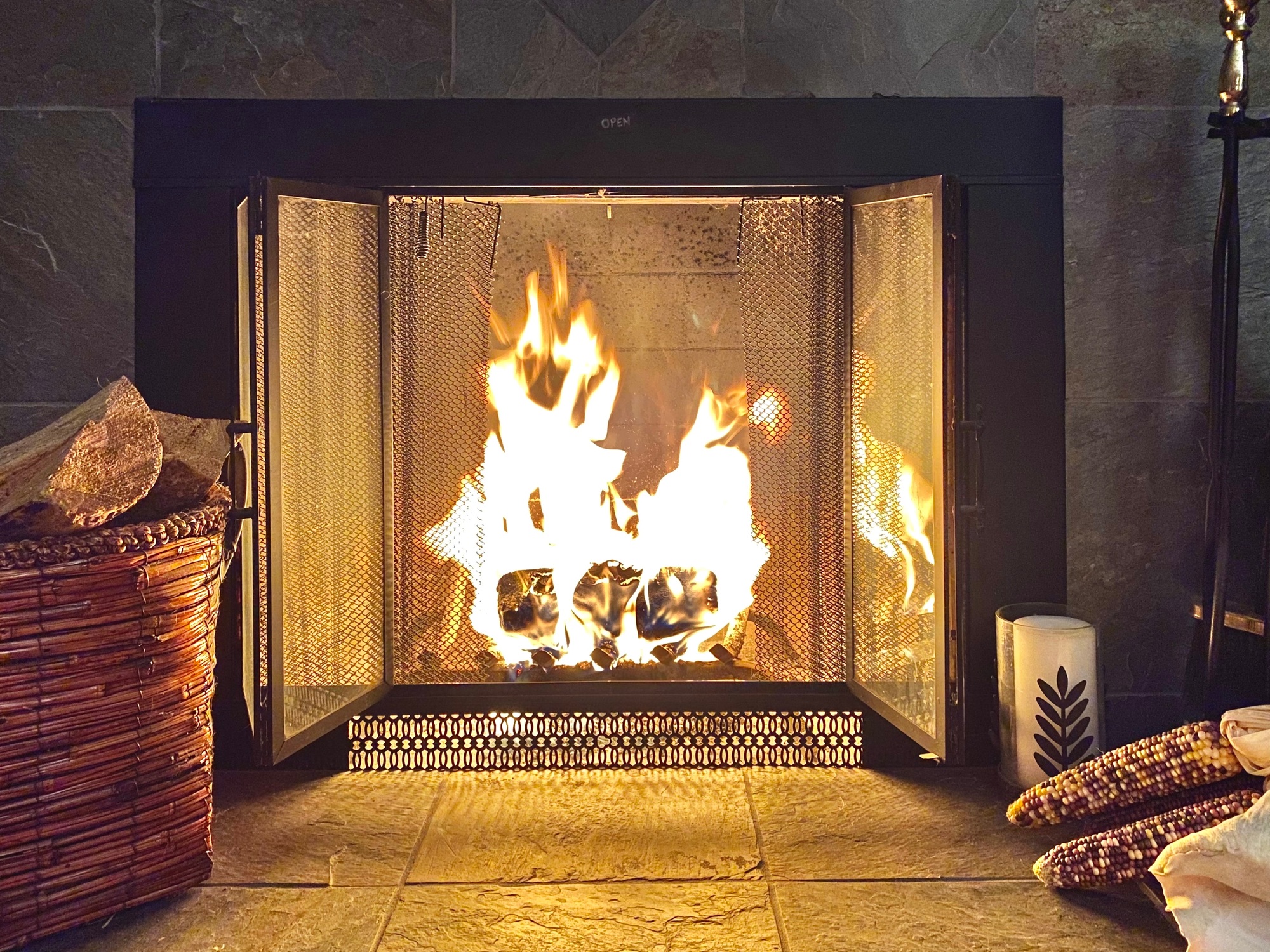 Perfect fireplace scene at home with roaring fire